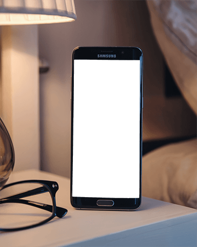 Nightstand Smartphone Mockup Standing Upright Soft Room Lighting Cozy Indoor Setting