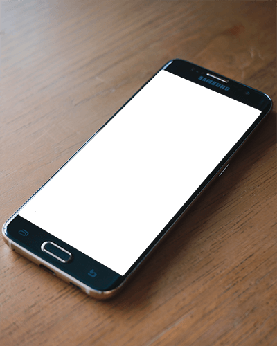 Angled Smartphone Mockup On Wooden Desk Natural Lighting