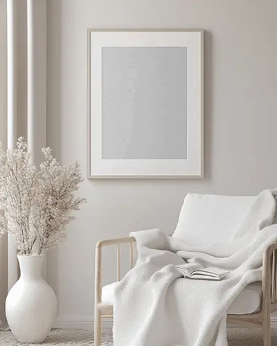 Elegant Neutral Interior Photoframe Mockup On Wall Above Textured Armchair And Vase With Dried Blooms Perfect For Promoting Modern Minimalist Artworks