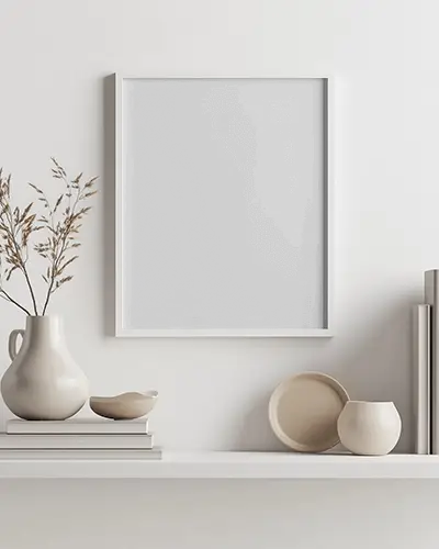 Modern Minimalist Wall Frame Mockup On White Shelf With Ceramic Decor And Neutral Tones For Stylish Art Print Or Poster Showcase