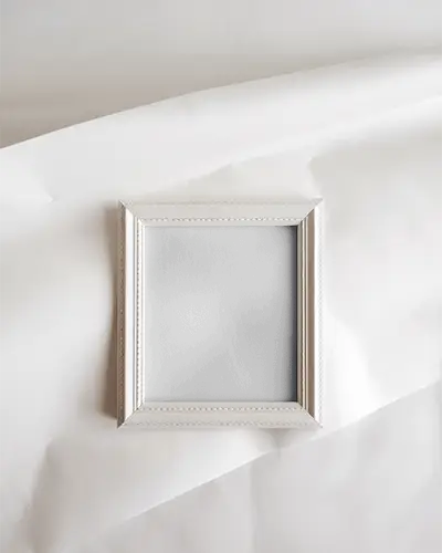 clean-elegant-frame-mockup-in-neutral-tones-on-white-textured-surface-for-stylish-design-showcases