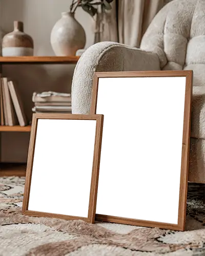 blank-photo-frame-mockup-on-textured-rug-next-to-cozy-upholstered-armchair