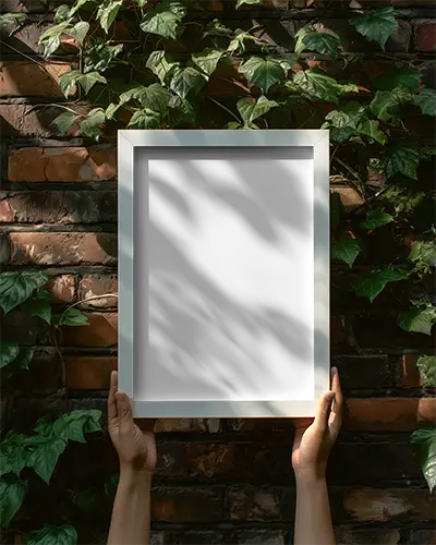 minimalist-blank-frame-mockup-outdoor-natural-light-shadow-play-nature-inspired-design-template