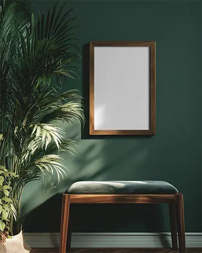 modern-wooden-frame-mockup-on-minimalist-green-wall-with-indoor-plant-and-bench-layout