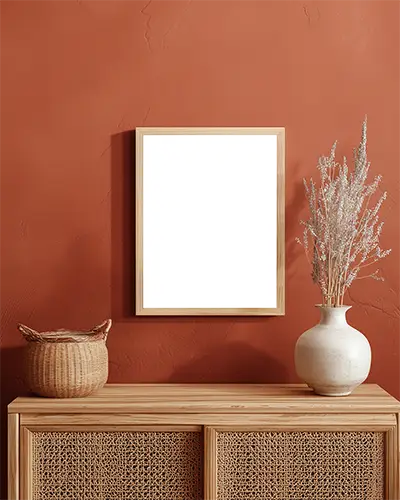 Minimalistic Wooden Frame Mockup Hanging On Textured Wall Near Decorative Vase And Basket