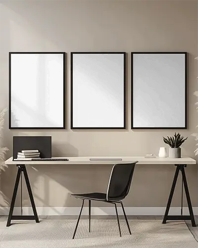 Minimalist Home Office Wall With Three Vertical Canvas Frames And Modern Workspace Setup