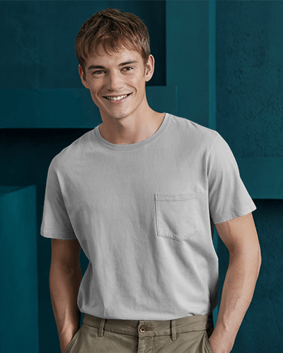 Urban Pocket T Shirt Mockup Male Model Against Dark Wall Soft Lighting Clean And Minimal Look Neutral To
