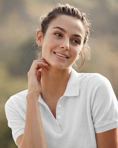 Vacation Themed T Shirt Mockup Happy Female Model In Sunlit Environment Breezy And Chic