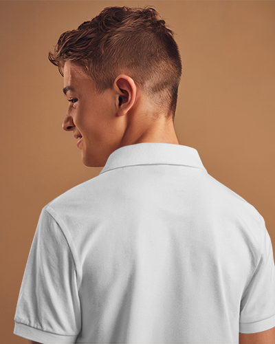 Edgy Polo Shirt Mockup Male Model Showing Back Design In Warm Orange Tone Against Matching Background Bold And Stylish Look