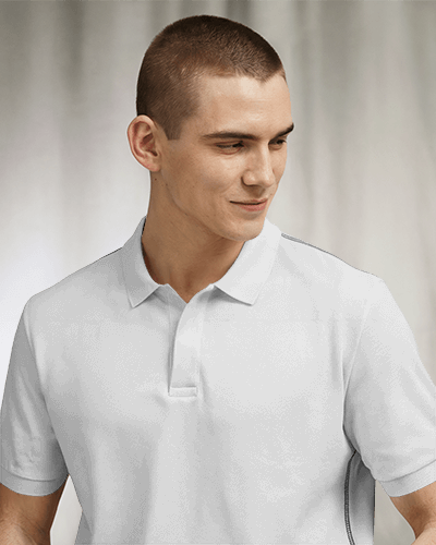 Earthy Tone Polo Shirt Mockup Male Model Smiling Against Soft Gray Background Bold And Modern Aesthetic