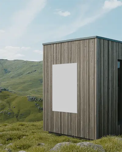 Vertical Minimalist Poster Mockup Attached To Wood Paneled Structure In Grassy Field