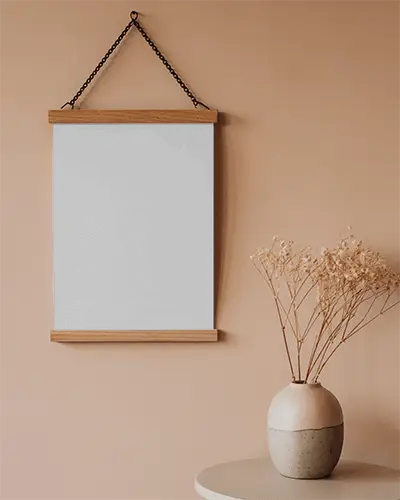 Minimalist Hanging Poster Mockup With Wooden Frames And Dried Flowers In Vase On Table