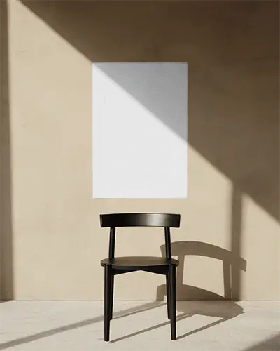 Vertical Poster Mockup On Textured Wall With Chair And Natural Light Shadow Effect
