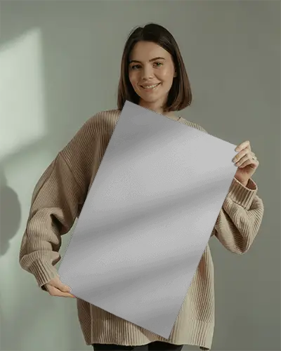 Smiling Woman Showcasing Vertical Poster Design Template In Simple Studio