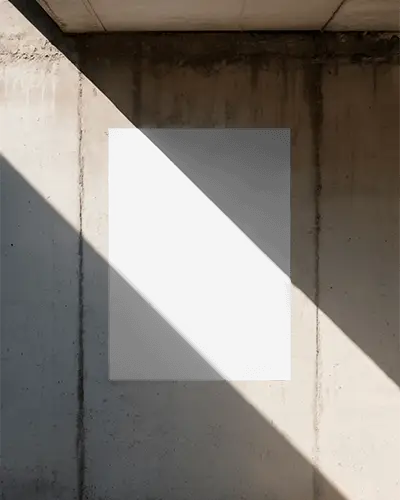 modern-minimalist-poster-mockup-on-grunge-concrete-wall-with-dramatic-shadow-light