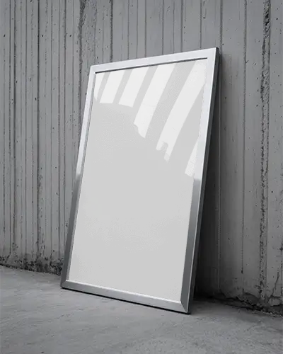 modern-urban-poster-frame-mockup-with-reflective-glass-leaning-against-textured-wall