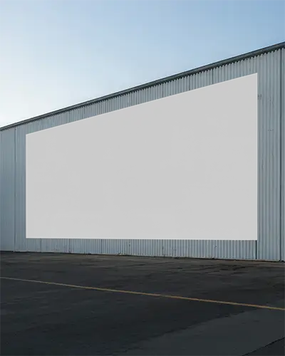 outdoor-industrial-wall-poster-mockup-for-large-scale-advertisement-presentation