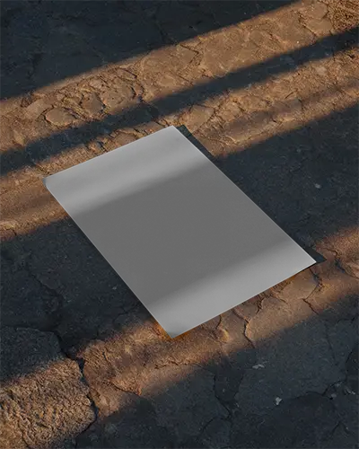 realistic-floor-poster-mockup-with-sunlight-shadows-casting-on-rough-road-surface