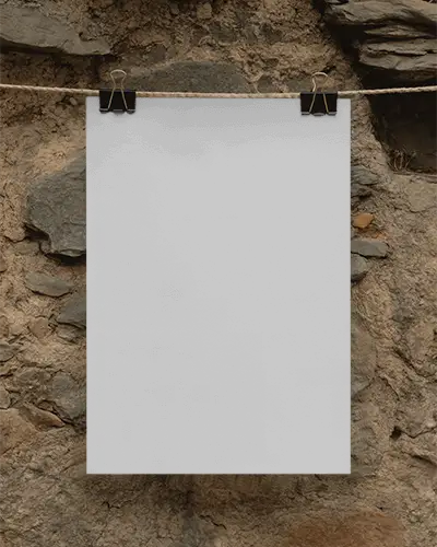 Vertical Paper Poster Mockup Attached With Metal Clips On String Against Rock Wall