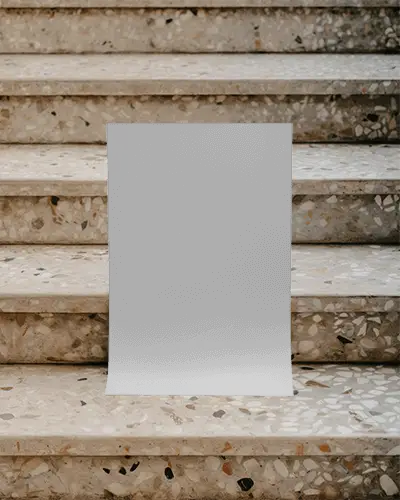 Vertical Poster Mockup Displayed On Textured Marble Stairs With Natural Light Background