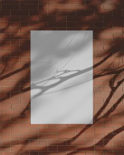 Vertical Poster Mockup On Brick Wall With Natural Shadow Effect For Design Display