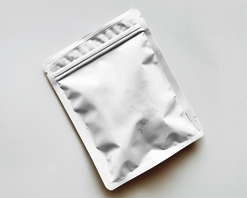 Crumpled Foil Pouch Mockup Minimalist Flat Lay Packaging Design With Subtle Shadows On White Background