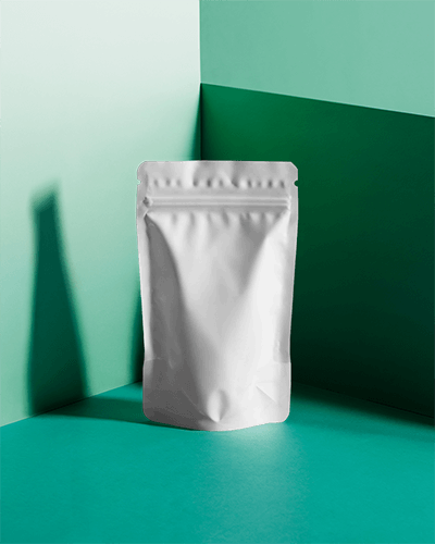 Modern White Pouch Mockup With Crisp Folds Set Against Bold Green Dual Tone Background Sharp Shadows And Clean Aesthetic