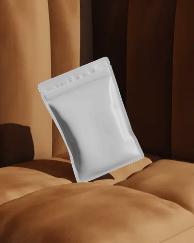 Tilted Pouch Mockup On Caramel Velvet Sofa Soft Warm Lighting Luxury Lounge Aesthetic