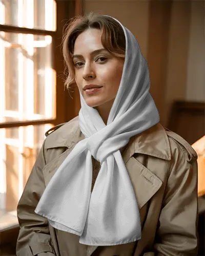 Premium Scarf Mockup Styled As Headscarf On Woman Model With Classic Trench Coat Look