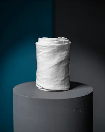 Luxurious Wrapped Scarf Mockup Emphasized On Round Podium Isolated Background