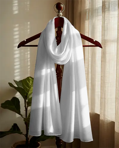 cozy-interior-scarf-mockup-draped-on-wooden-stand-with-soft-window-light-and-warm-curtain-background