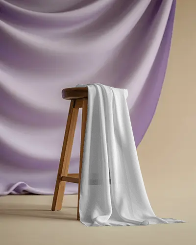 Elegant Scarf Mockup Silk Fabric Draped Over Wooden Stool With Purple Backdrop In Studio Setting