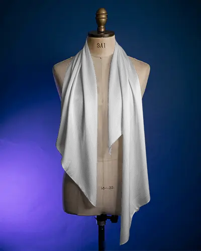 elegant-scarf-mockup-draped-on-mannequin-against-deep-blue-and-purple-gradient