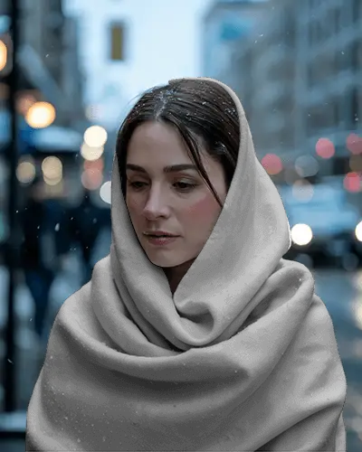 premium-scarf-mockup-styled-on-female-model-with-snowfall-in-urban-backdrop