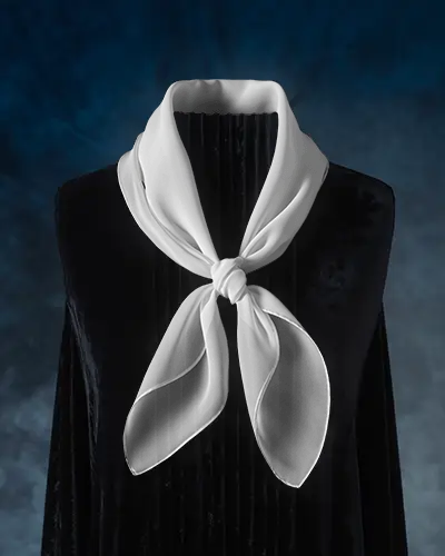 elegant-scarf-mockup-knotted-display-on-dark-mannequin-with-blue-studio-background