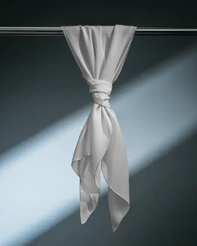 elegant-scarf-mockup-knotted-display-on-metal-rod-with-dramatic-spotlight-effect