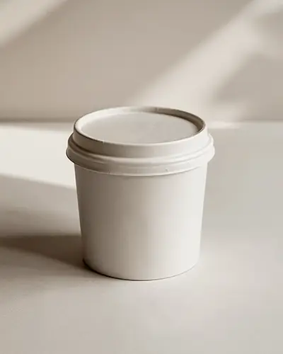 Sunlit Paper Cup Sticker Mockup Minimal Tabletop Scene With Soft Shadows And Neutral Tones For Elegant Brand Presentation 0124