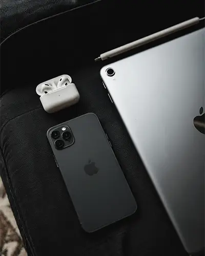 High Quality Wireless Earbuds With Charging Case Digital Tablet And Smartphone Gadget Arrangement