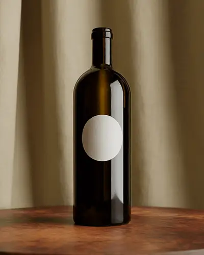 Elegant Wine Bottle Sticker Mockup With Round Paper Label On Dark Glass And Soft Curtain Backdrop 0276