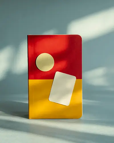 Round And Rectangular Stickers Mockup On Stylish Notebook For Branding Promotion Use