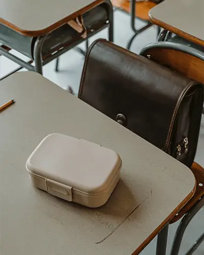 Flat Lay School Desk Sticker Mockup On Minimal Lunchbox