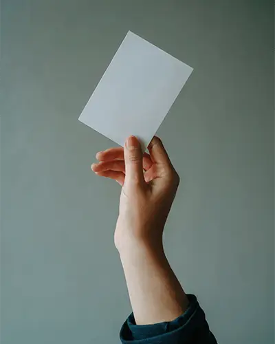 Hand Holding Sticker Mockup For Custom Designs And Personalized Labels