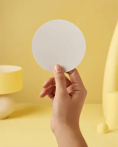 Hand Holding Round Sticker Mockup With Minimalist Background For Branding Design Projects