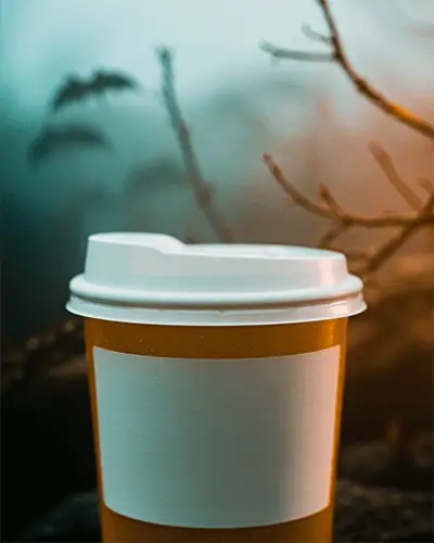 Blank Coffee Cup Sticker Mockup For Custom Branding And Promotional Design Mockups