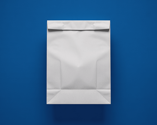 Paper Bag Sticker Mockup On Bold Blue Background Clean Packaging Minimal Brand Visual