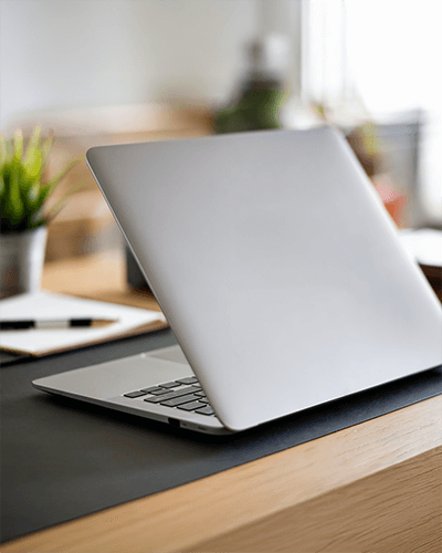 Minimalist Macbook Sticker Mockup Clean Desk Setup With Soft Lighting And Organic Elements