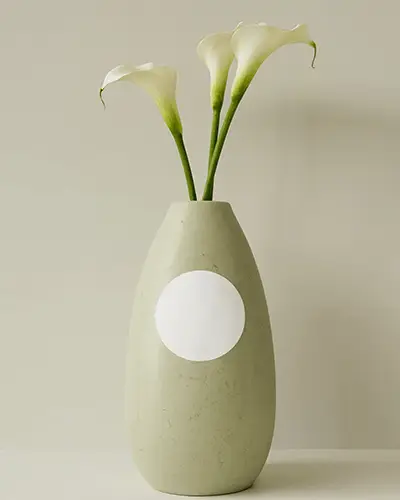 Minimal Ceramic Vase Sticker Mockup Round Label On Tall Vase With Calla Lilies Clean Studio