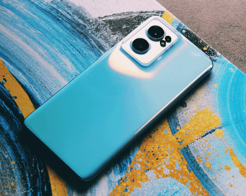 Blue Smartphone Sticker Mockup On Artistic Background For Bold Tech Display