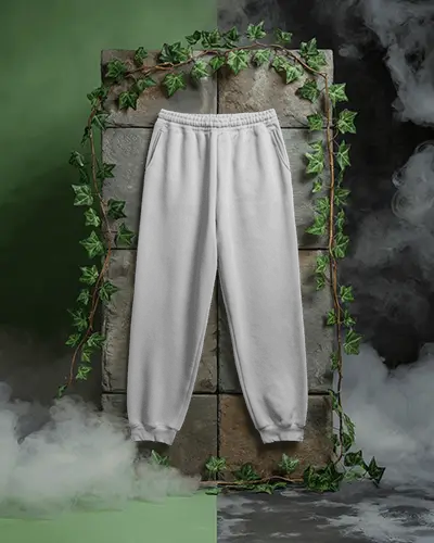 ivy-stone-frame-sweatpant-mockup-half-green-half-dark-mystical-vines-with-smoky-surroundings
