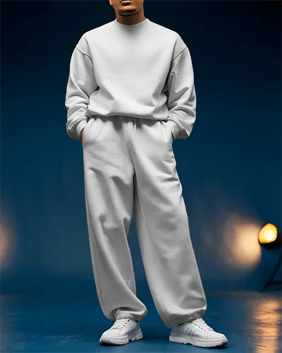 male-model-wearing-sweatpant-mockup-in-studio-posing-with-hands-in-pockets-streetwear-style
